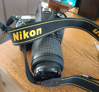 NIKON D7100 CAMERA WITH DX AF-5NIKOR 55-200 LENS.