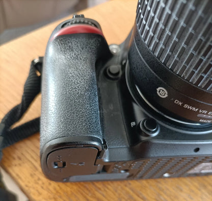 NIKON D7100 CAMERA WITH DX AF-5NIKOR 55-200 LENS.