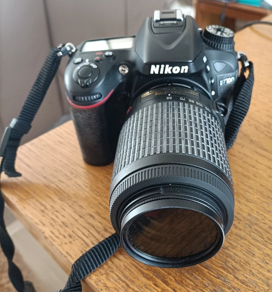 NIKON D7100 CAMERA WITH DX AF-5NIKOR 55-200 LENS.